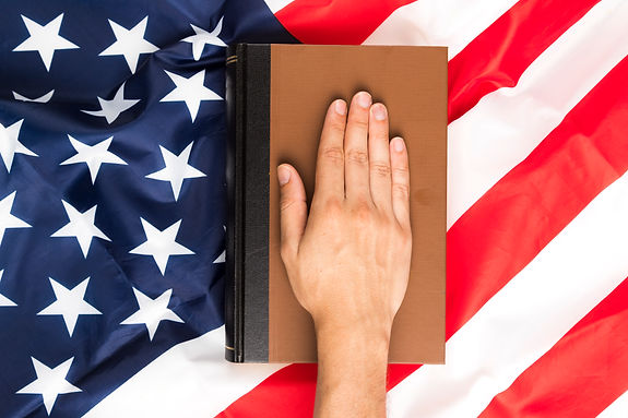 top-view-hand-book-american-flag.jpg