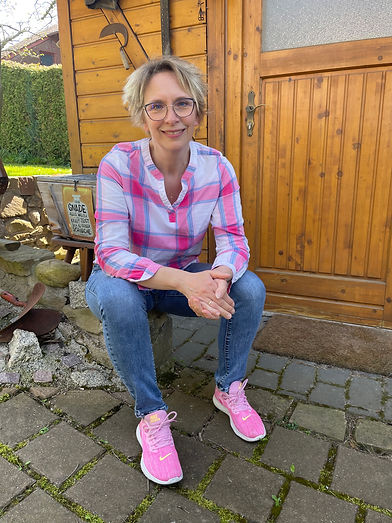 Sitzende Frau