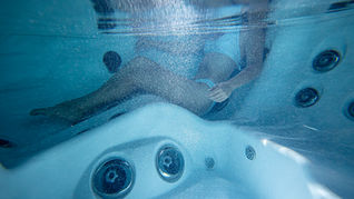 Looking for a Natural Way to Help with Back Pain? How a Jacuzzi® Hot Tub Could Help
