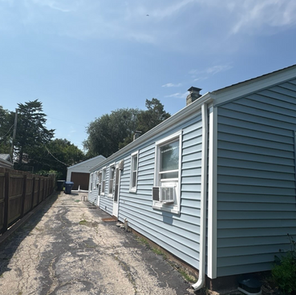 Completed vinyl siding replacement on a St. Louis area home