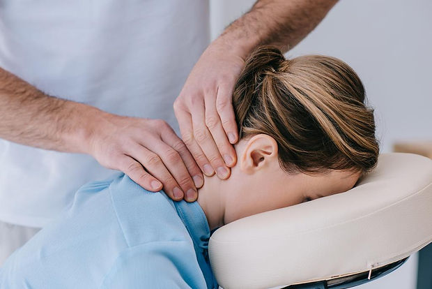 stock-photo-close-shot-masseur-doing-neck-massage-businesswoman.jpeg