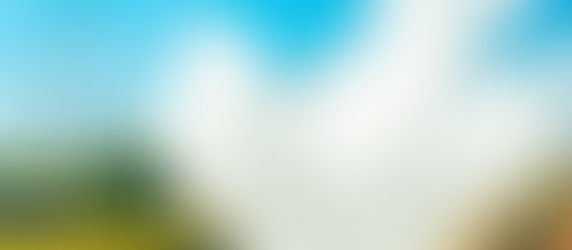 Thorpe Park's Tidal Wave splashes down while Stealth prepares to drop down its hill in the background.