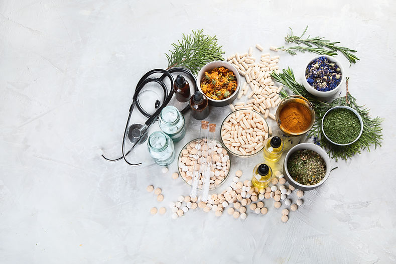 Alternative medicine herbs and homeopathic globules. Homeopathy medicine concept. Top view