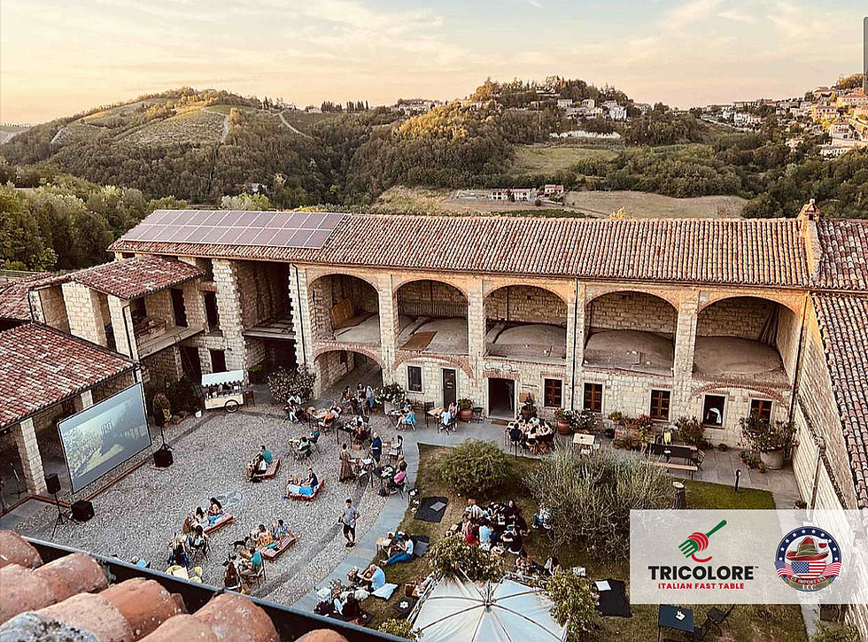 Traditional Italian masseria courtyard with outdoor dining, guests enjoying authentic Italian food and wine in a scenic count