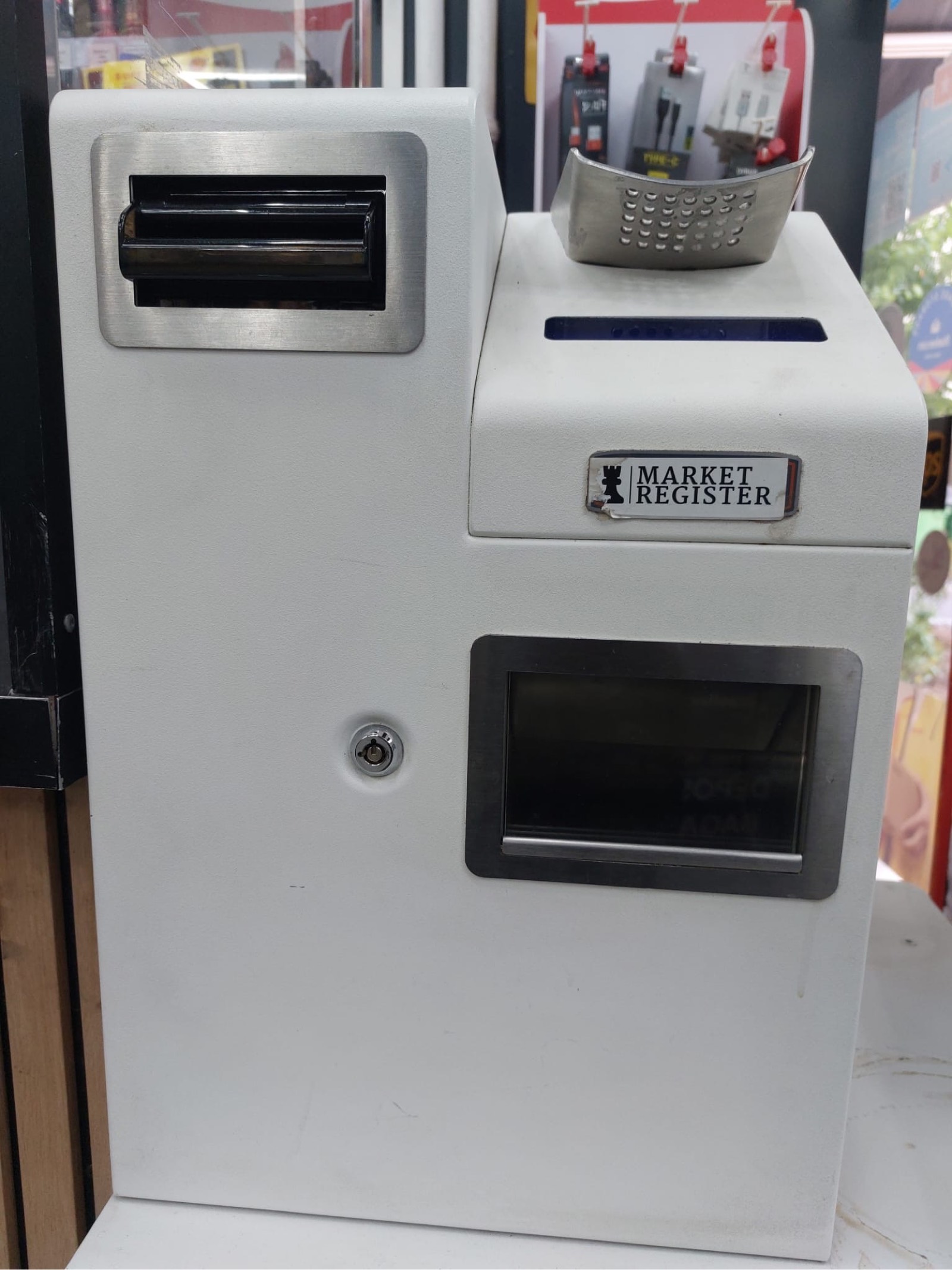 Monnayeur automatique Market Register