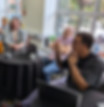 Participants discussing potential AI opportunities during a facilitated small-group session
