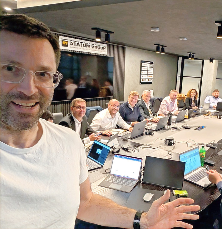 Senior leadership team collaborating during an in-person AI4SLT workshop