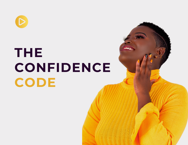 a woman in a yellow sweater stands in front of a sign that says the confidence code
