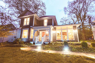 Exterior shot of a historic Victorian house at sunset in Williams Bay near Geneva Lake.