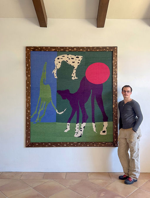 Reilly Sheriff with his work, "Pasture for Dogs to Roam"