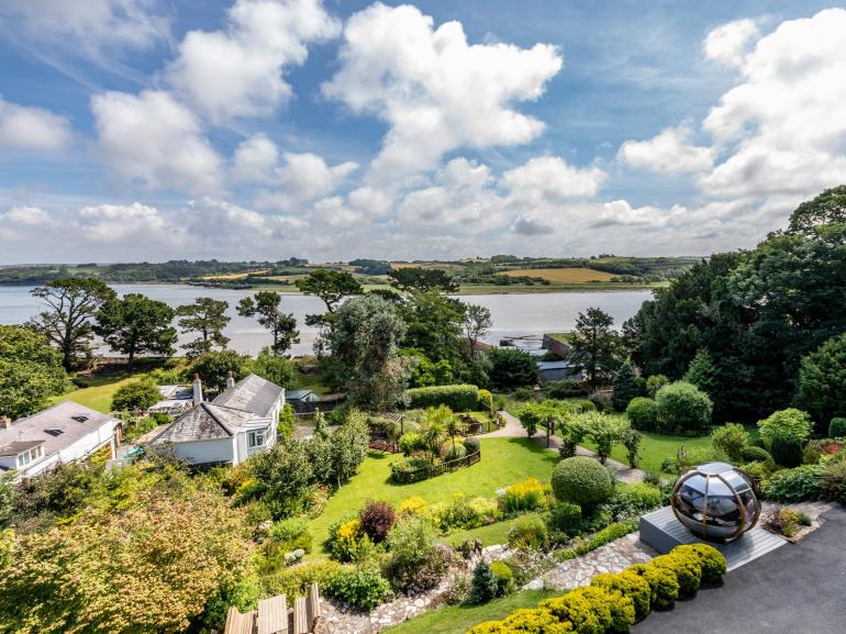 Oval House Pod by Ornate Garden in Country Setting