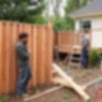 Man building a 6 ft fence and another build a deck in a back yard.jpg