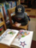 C reading Philly Fanieul Library.JPG