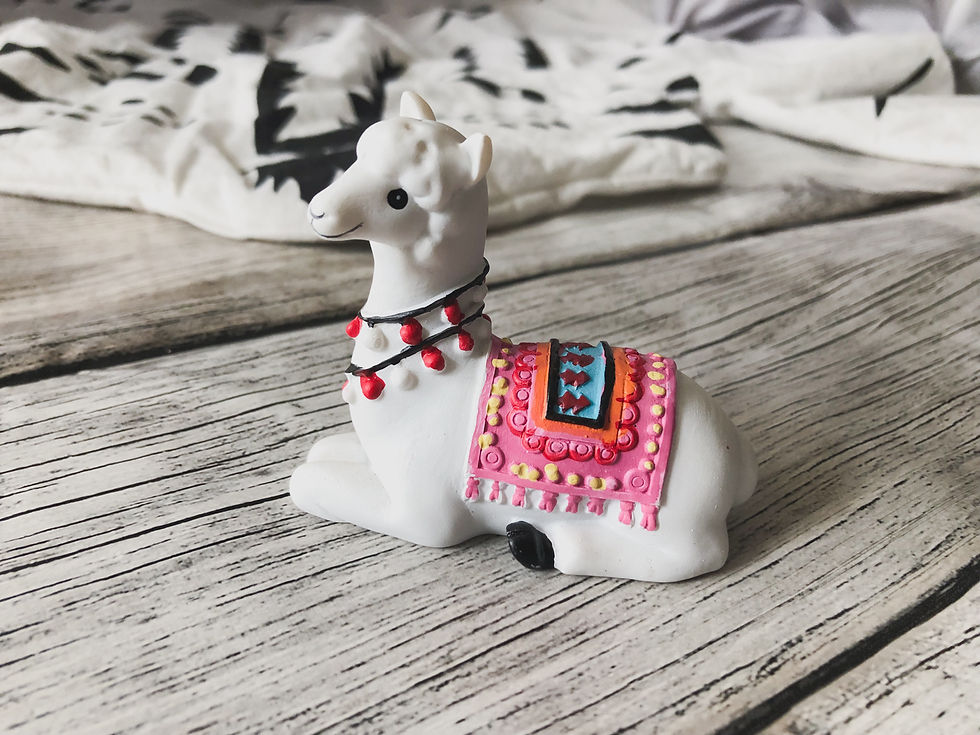 Miniature : Figurine lama couché blanche