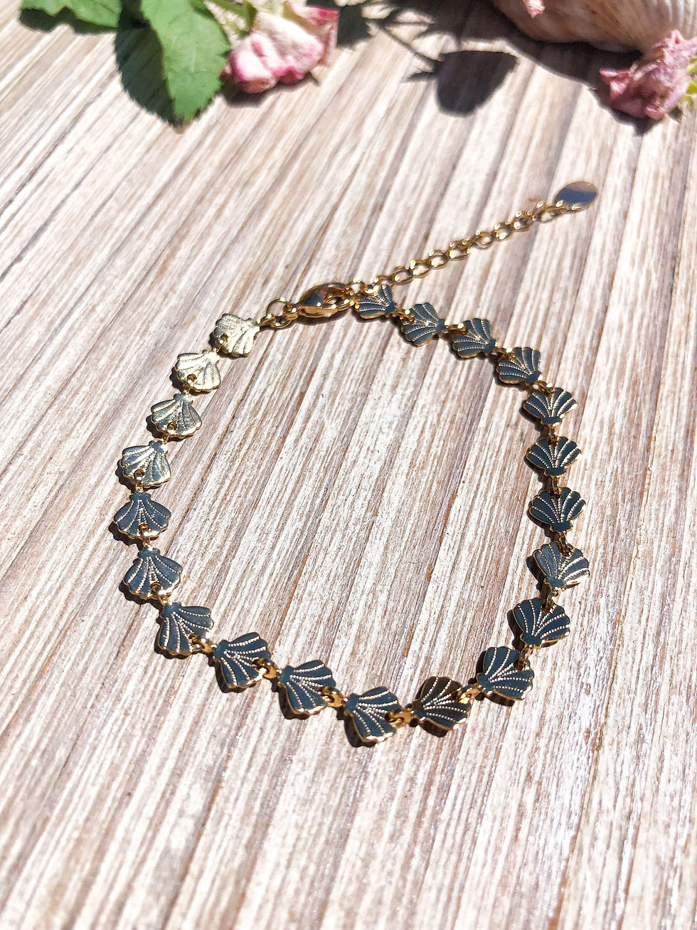 Thumbnail: Bracelet à coquillages dorés