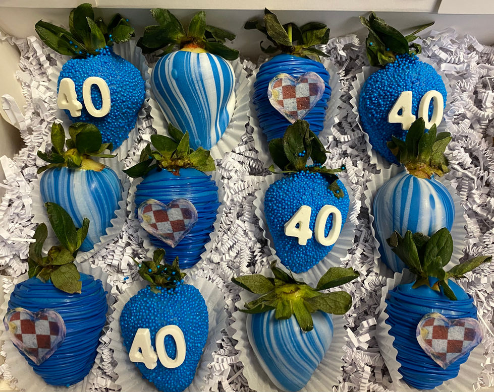 a box of blue and white chocolate covered strawberries with the number 40 on them