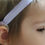 Thumbnail: Young child wearing a headband, close-up shot of face and ear.
