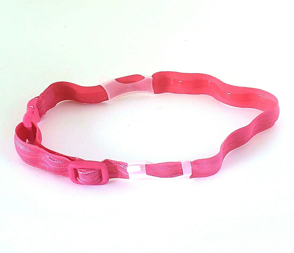 Pink headband with a buckle, simple design on a white background.
