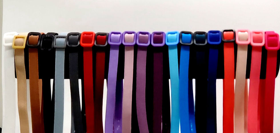 Colorful straps with buckles presented in an organized display Michela Design Canada