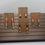 Thumbnail: Colorful earrings displayed on brown cards with star charms and gold hooks.