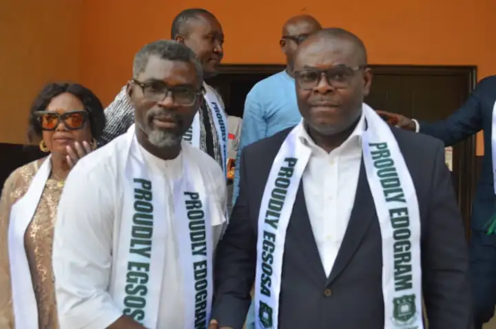 Two members wearing Proudly Edogram and Proudly EGSOSA sashes