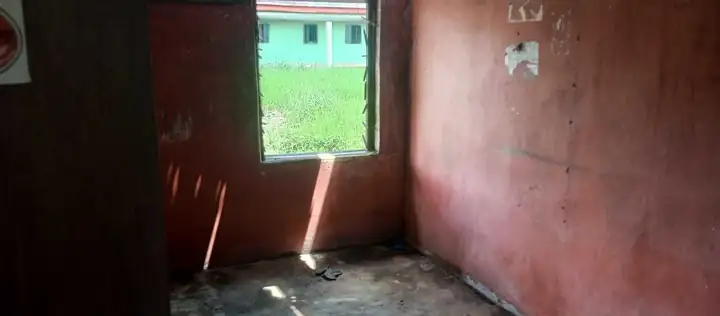 A red-walled room in the old block open to the sky