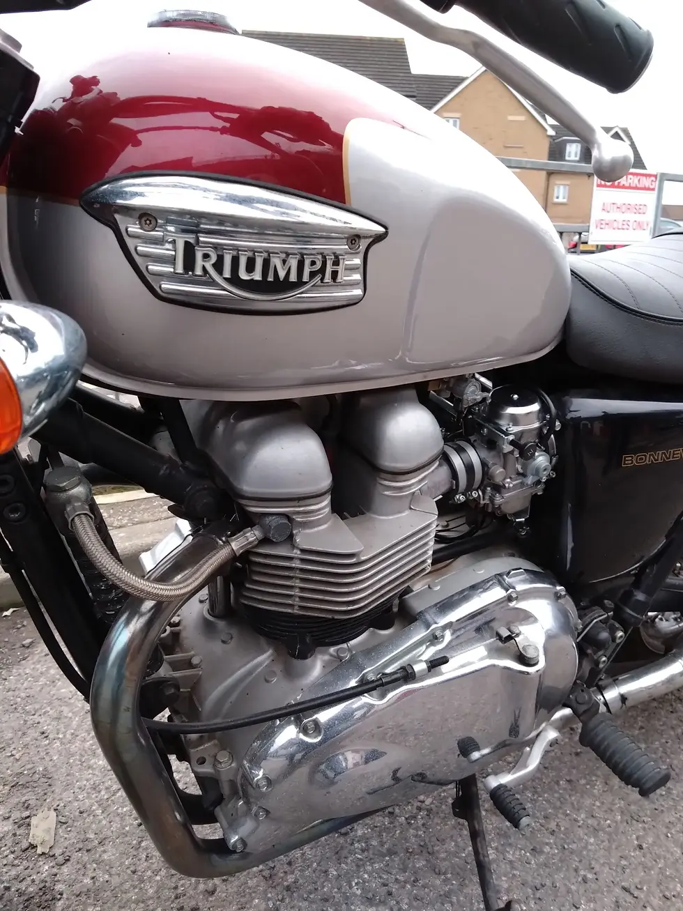 Triumph motorcycle with engine and fuel tank, Malcsmotorbikespares.
