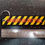 Thumbnail: Black and yellow Danger Do Not Pull tag near a ruler Malcsmotorbikespares