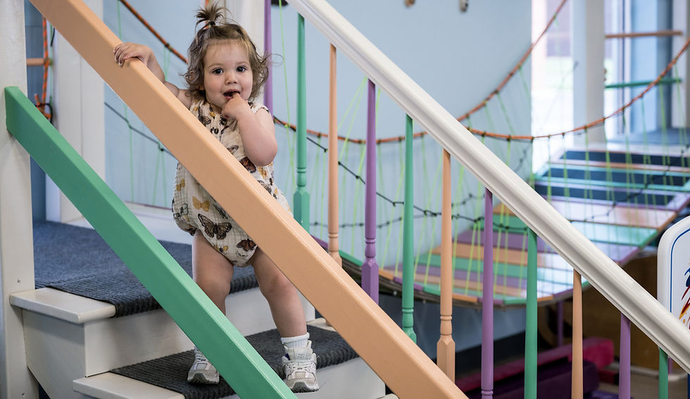 Child   practicing balance and coordination during pediatric physical therapy