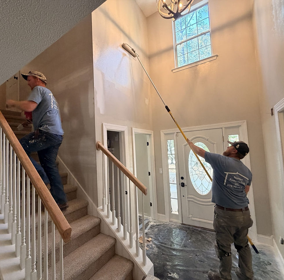 norton-remodeling-interior-stairwell-crew-painting.jpg