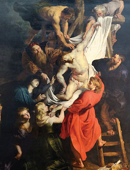 The Descent from the Cross by Peter Paul Rubens: Christ's pale body is lowered in a white shroud by figures on ladders, with John in red at the centre.