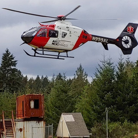 Airlift Northwest Helicopter landing  on the landing pad at Station 27