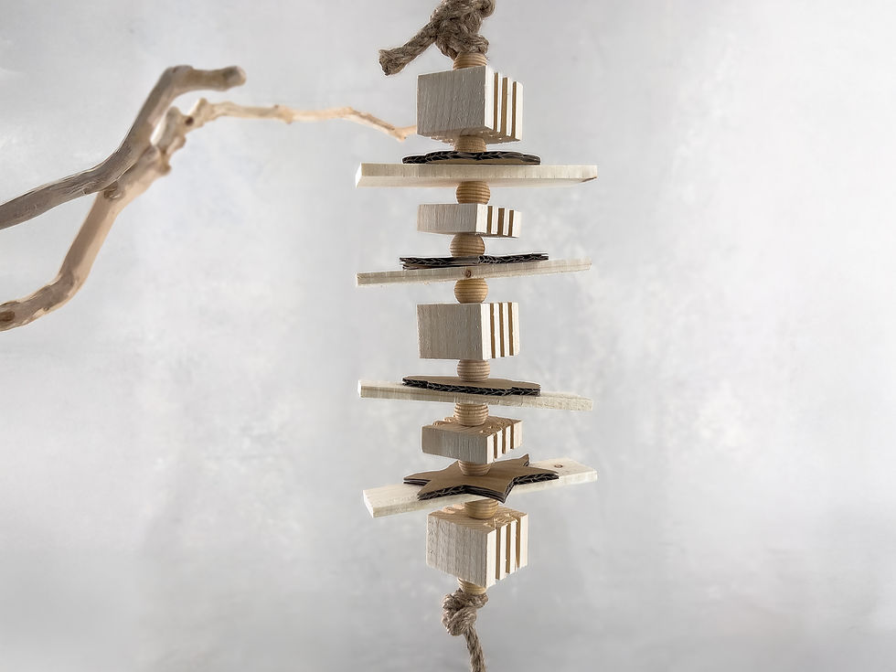 Natural shreddable parrot toy made made with natural soft pine blocks, cardboard paper, hemp rope, and wood beads.