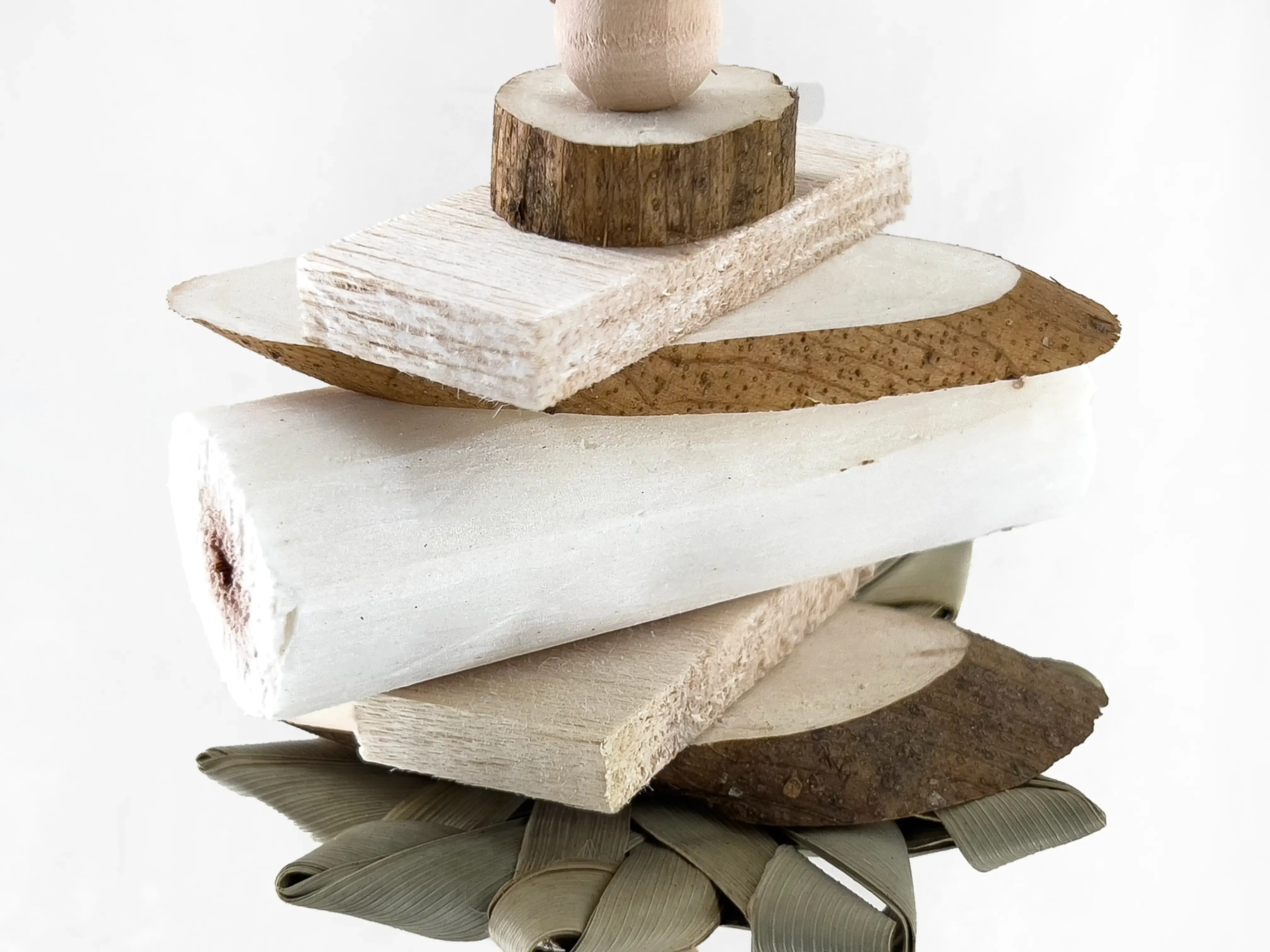 All natural parrot chew toy made of sola wood, balsa wood, palm, and wood beads.