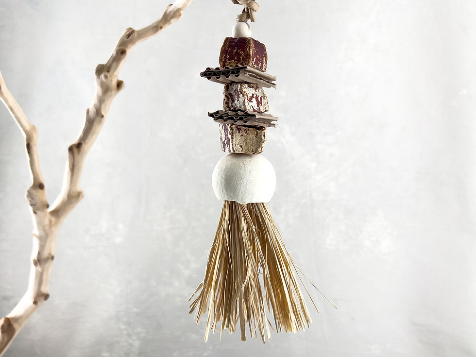 Natural shreddable bird toy and preening toy for birds, made of mahogany pod slices, raffia grass, pod cup, wood beads.