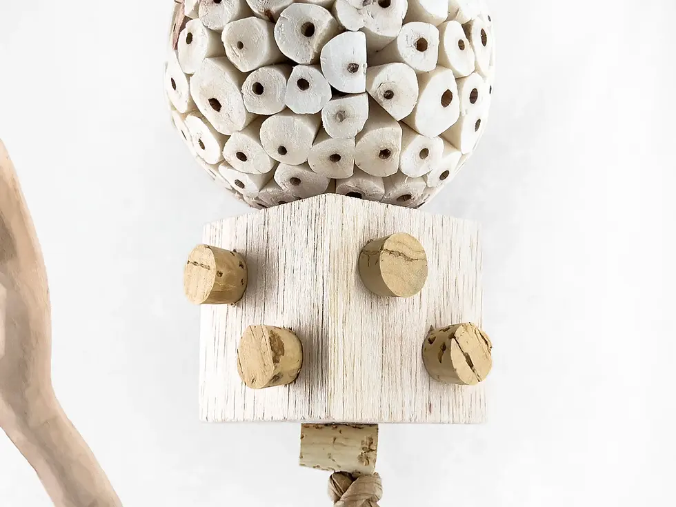 Natural sola, balsa, and cork wood bird toy for small to medium sized parrots.