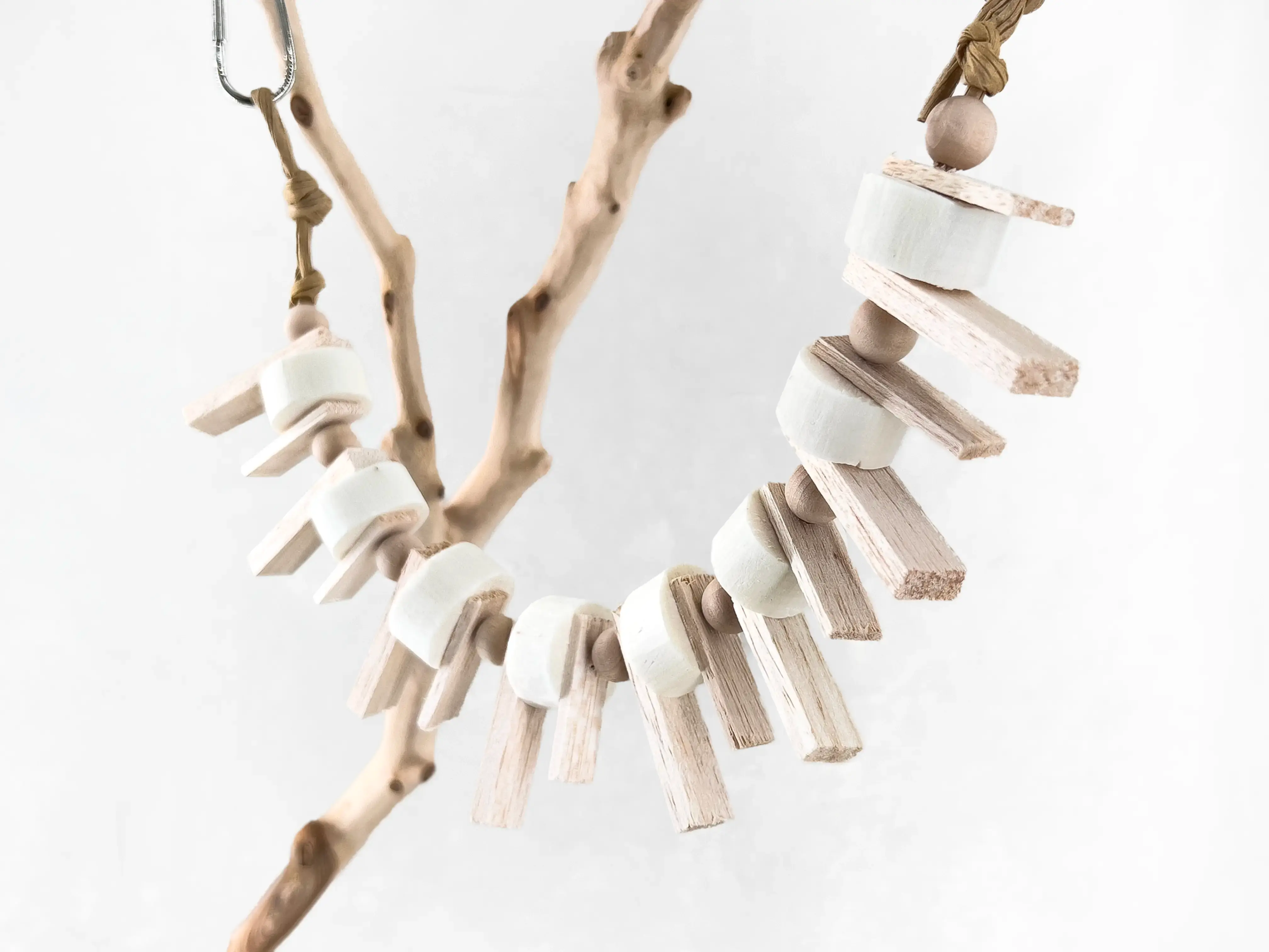 Handmade all-natural parrot cage garland bird chew toy featuring two separate attachment ends for versatile placement options