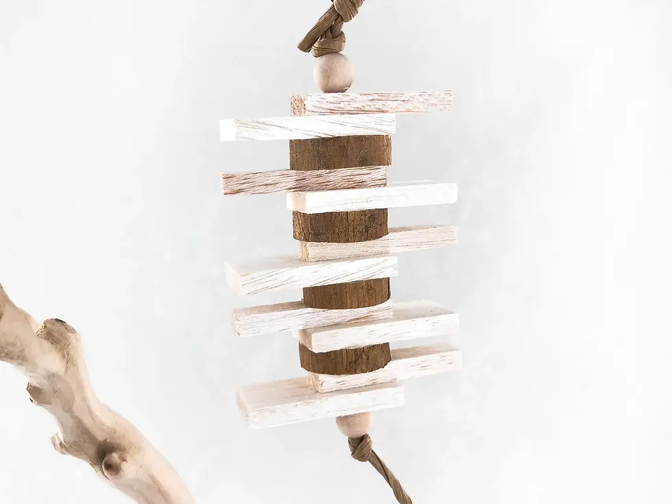 Handcrafted soft wood bird toy featuring bird-safe materials to support beak health and provide essential mental enrichment.