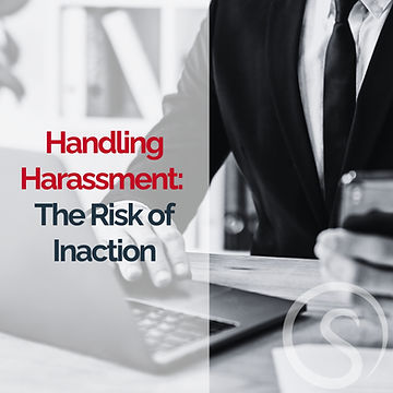 Businessman in suit using a laptop and smartphone. Text: "Handling Harassment: The Risk of Inaction." Serious tone, modern office.