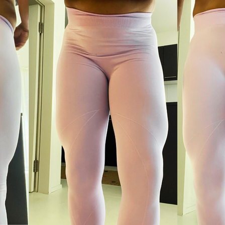 Strong female athlete training legs for wellness bodybuilding category.