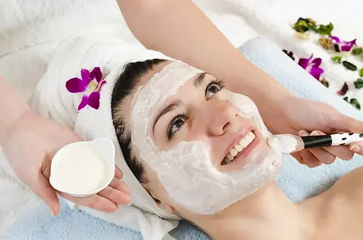 Client enjoying basic and advanced facial treatments