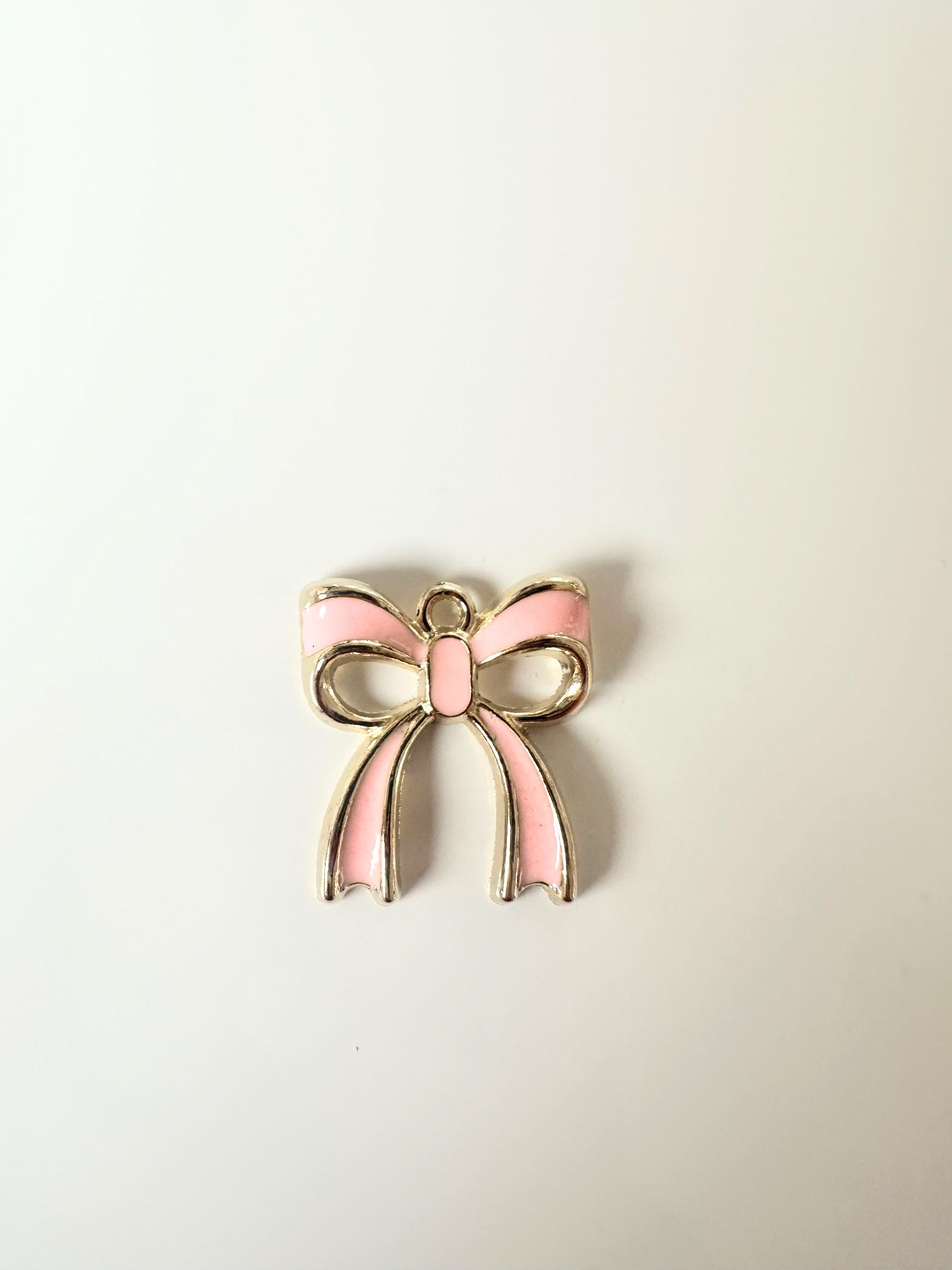 Noeud rose et or