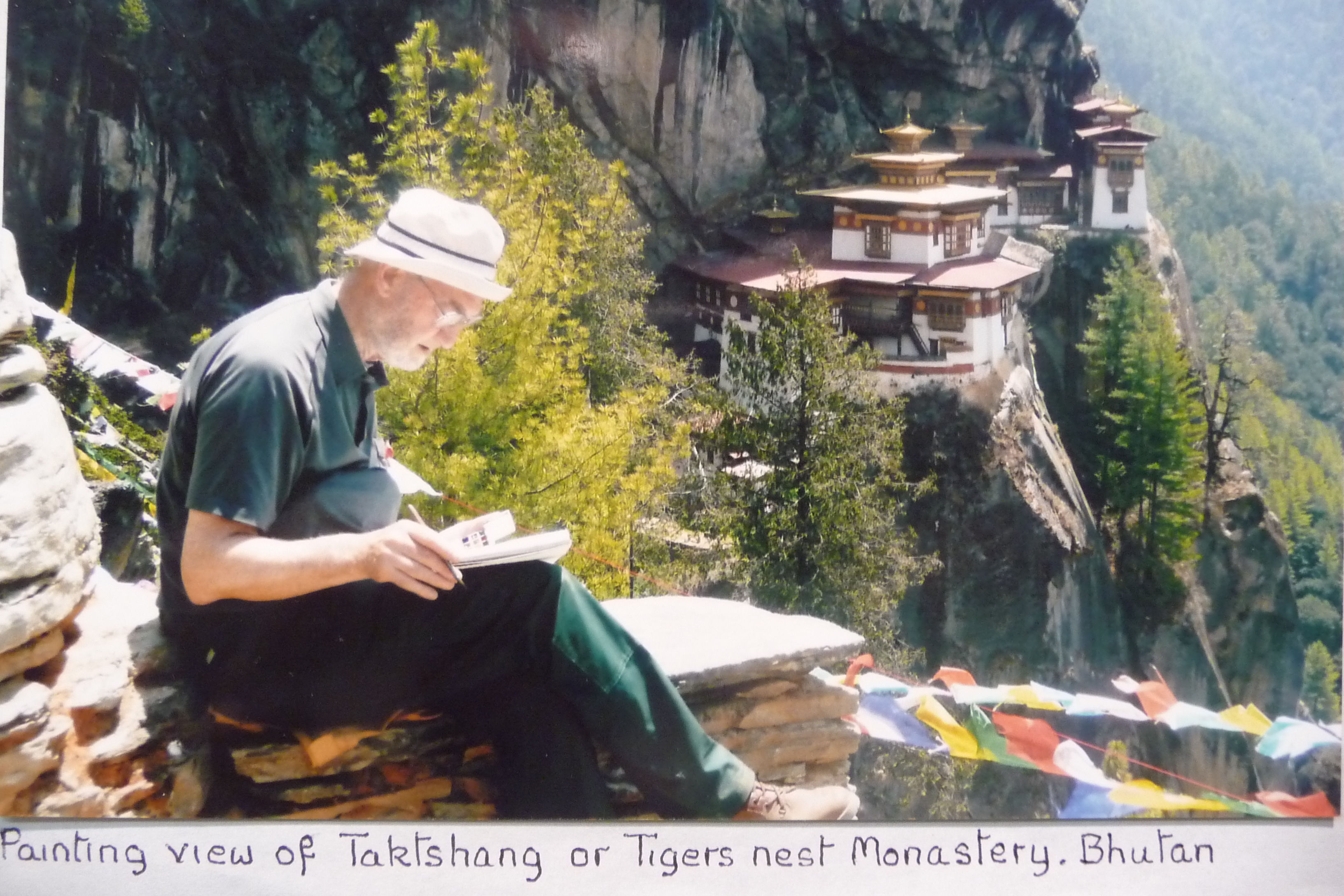 Photograph of me painting the breathtaking sight of Tigers Nest Monastery, 2009