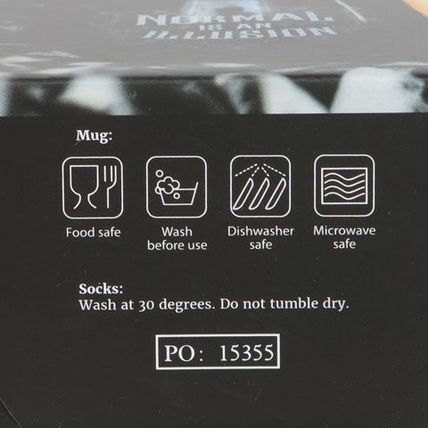 Thumbnail: Normal is an Illusion Gothic Mug and Socks Set