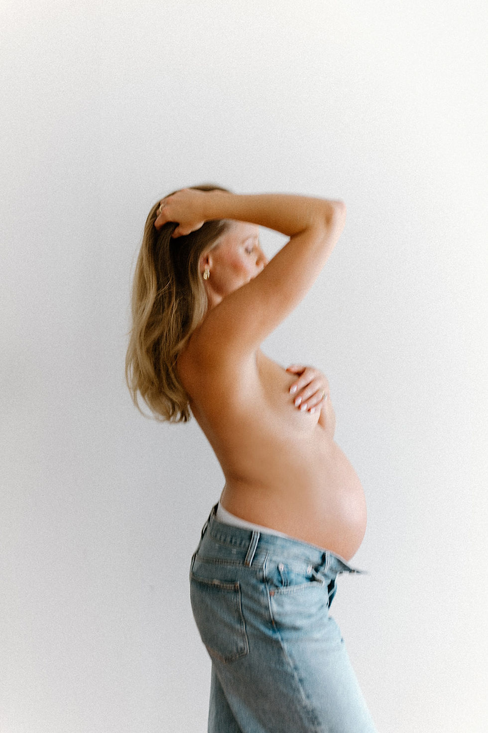 	Motherhood portrait session capturing connection and beauty during pregnancy