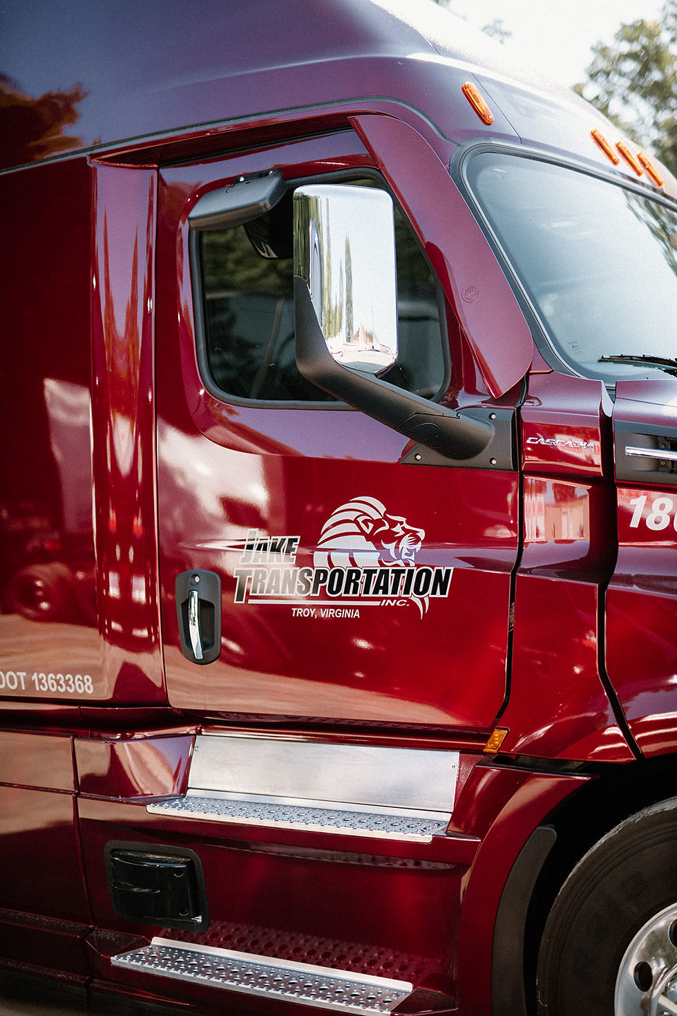 Red semi truck used for freight transportation and logistics services
