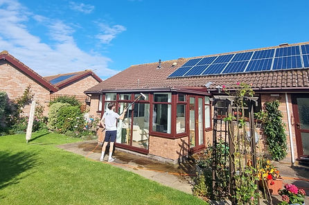 SSR Window Cleaning at a home with roof-mounted solar panels