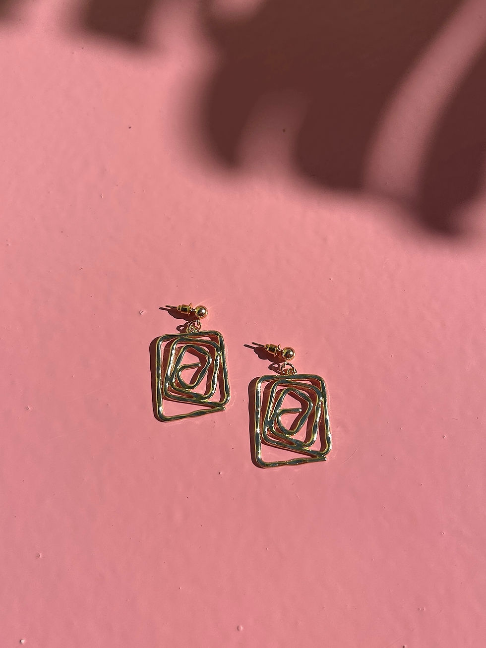 Thumbnail: gold plated spiral earrings on a ball stud fastening