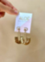 hammered gold arch earrings on tag