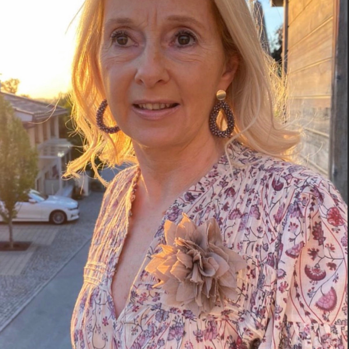 Earrings with blonde hair